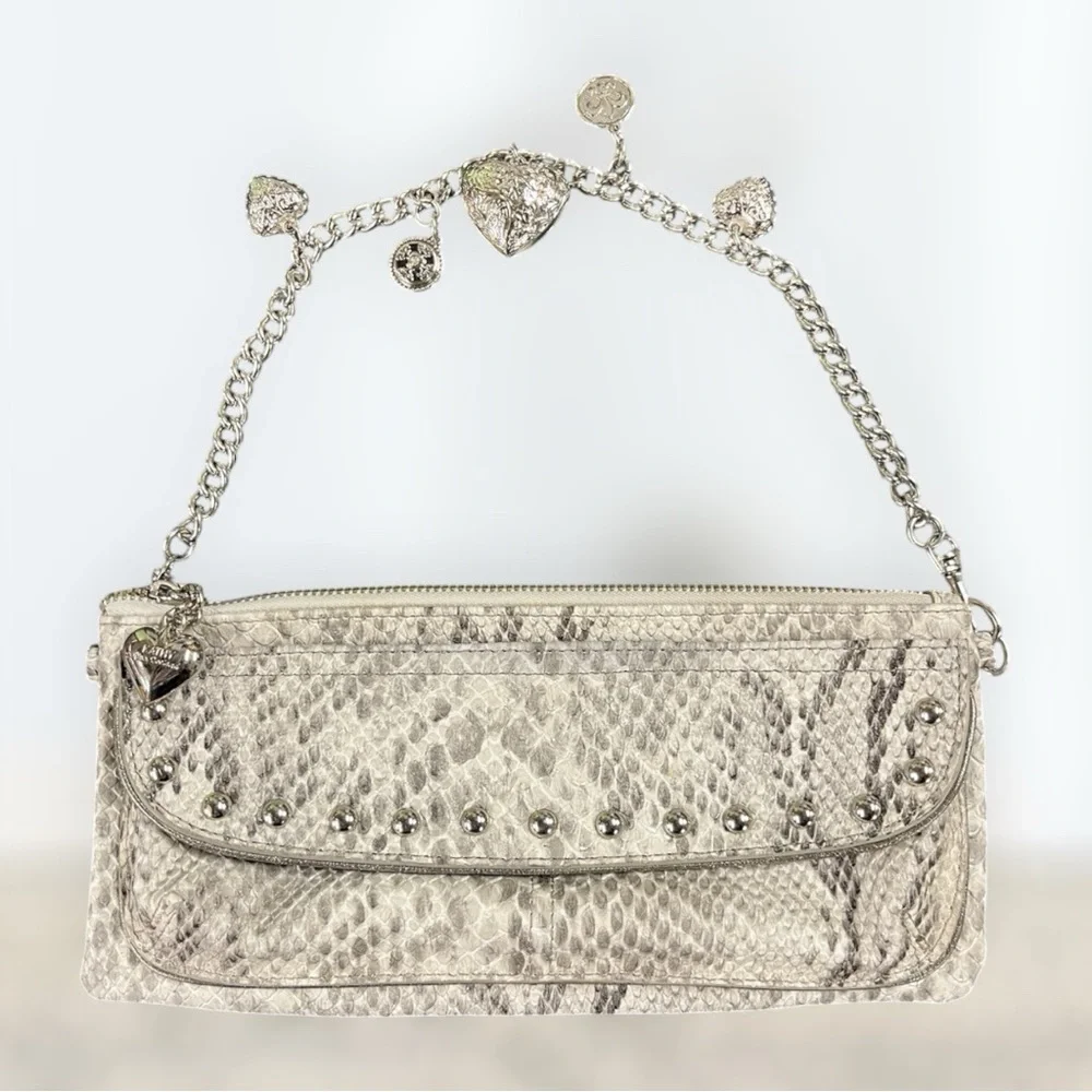 Kathy Van Zeeland faux leather clutch